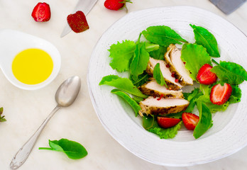 green salad with chicken and strawberry