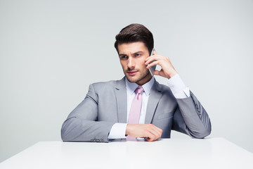 Confident businessman talking on the phone