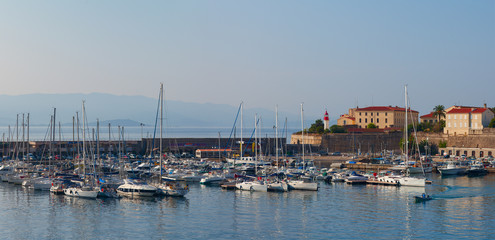 Fototapeta na wymiar Early morning in the port of Ajaccio. Corsica, France.