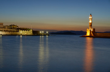Lighthouse in the old port in the evening, Chania, Crete.