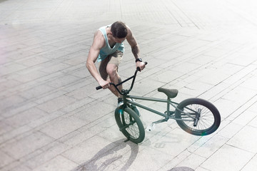 Naklejka premium bmx bike rider on the highlights