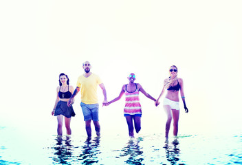 Naklejka premium Diverse Beach Summer Friends Holding Hands Concept