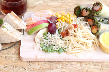 Pasta spaghetti with salad mix fruit and vegetables