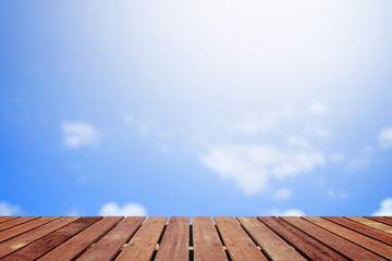 blue sky with wooden floor