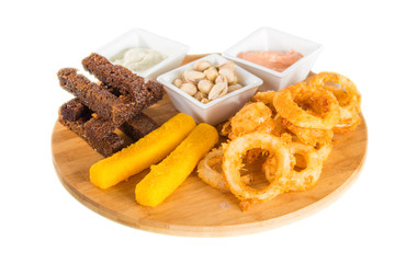 Cheese sticks, onion rings, crackers, salted peanuts and sauce
