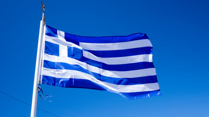 national flag of Greece against blue sky background