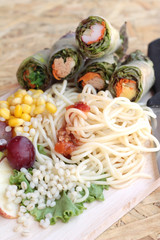 Pasta spaghetti with salad mix fruit and vegetables