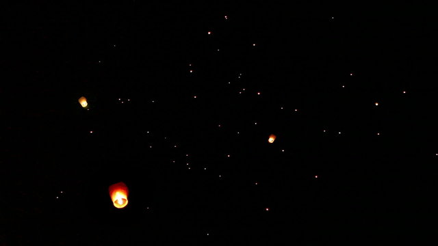 Flying magic Lanterns night sky background 