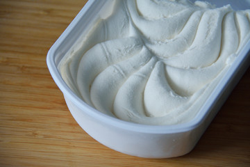 box of vanilla ice-cream in wavy pattern