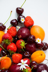 Summer Berries and Fruits cherries, strawberries, plums, apricot © manuta