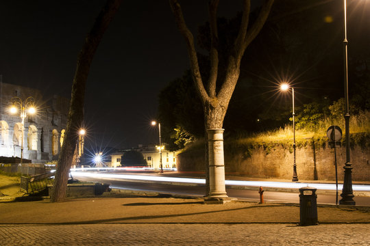 street in Rome at night with light trails
