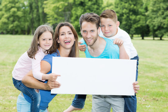 happy family with copy space board 