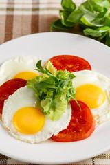 Fried eggs with vegetables