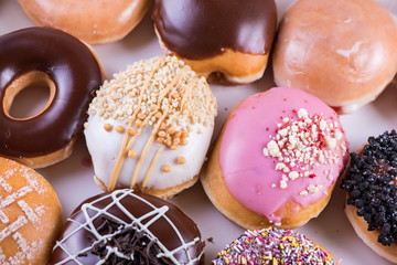 overhead view on vibrant donuts in box