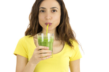 Woman drinking green smoothie