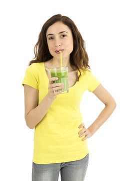 Healthy lifestyle woman drinking green smoothie