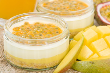 Mango & Passion Fruit Cheesecake - Individual potted dessert made with mango and passion fruit...