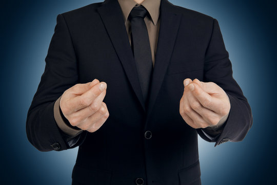 Businessman making a hand gesture - asking for money