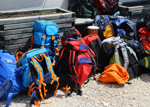 bunch of backpack before departure in the high mountains