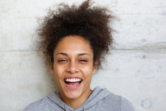 Laughing african american young woman