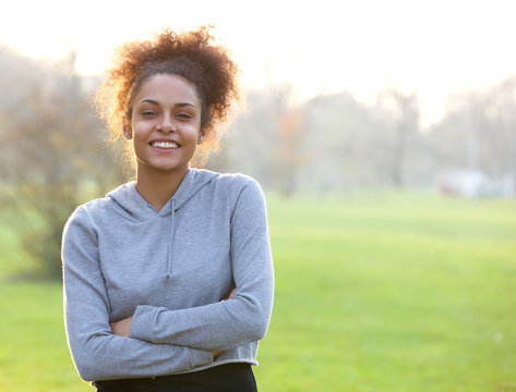 Friendly Young Woman Standing Outside