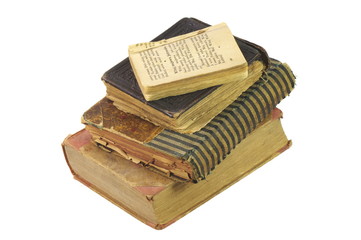 Nearly a century old books, hand bound by a bookbinder and the old scout songbook. On the white background, isolated.