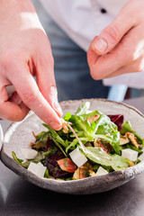 chef making salad