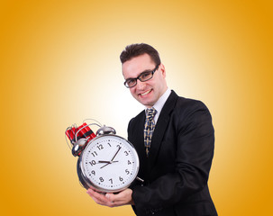 Man with time bomb isolated on white