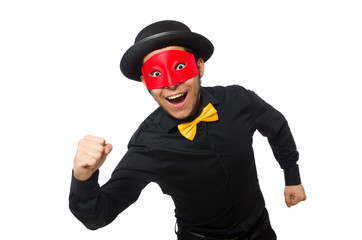 Young man in black costume and red mask isolated on white