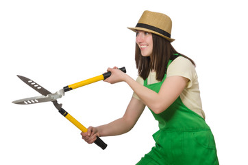 Young woman with shears on white