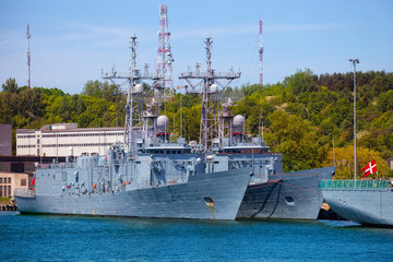 Navy warship moored at the wharf in the port of Gdynia, Poland. - obrazy, fototapety, plakaty