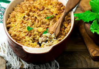 Crumble with forcemeat and sunflower seeds