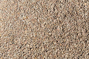 Gravel background texture with many small stones