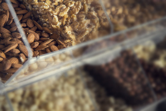 Nuts on plastic shelfs