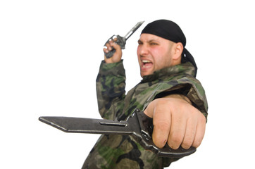 Young man in soldier uniform holding knife isolated on white