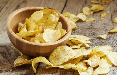 Potato chips in bowl, selective focus