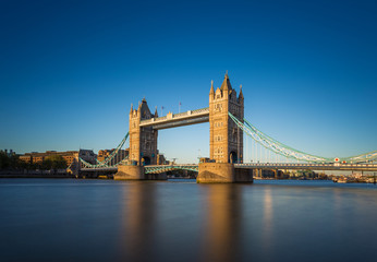 The iconic Tower Bridge at sunset with clear blue sky, London, UK