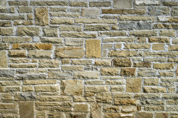 New stone cladding plates on the wall