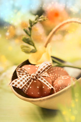 Easter background with eggs and spring flowers