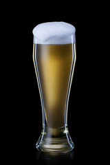Beer. Beer into glass on black background