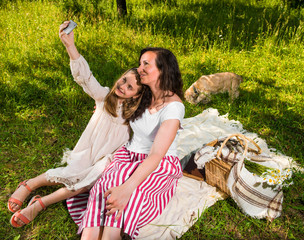 Mother and daughter taking a selfie