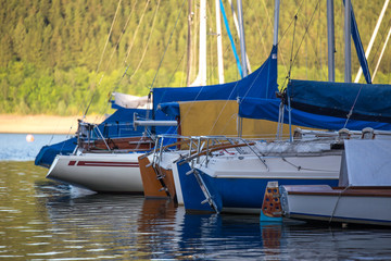 Fototapeta na wymiar sport boat harbor on a lake