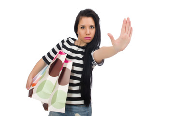 Woman with shopping bags isolated on white