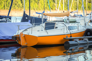 Fototapeta premium sport boat harbor on a lake