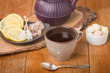 Tea with marmalade, chrystal sugar and lemon