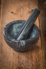 Black marble mortar with pestle