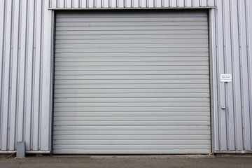 Obraz na płótnie Canvas Garage, door, gray, industrial, steel, ramp, storage