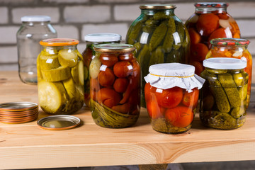 Jars of Pickled Vegetables on Wooden Table