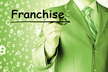 business man writing franchise