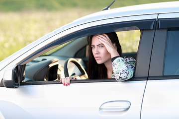 Young woman driving  car